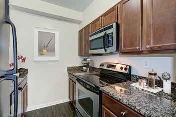 Fully furnished kitchen with stainless steel appliances 